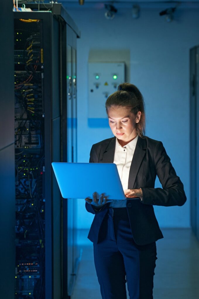 IT engineer specialist working in network server room